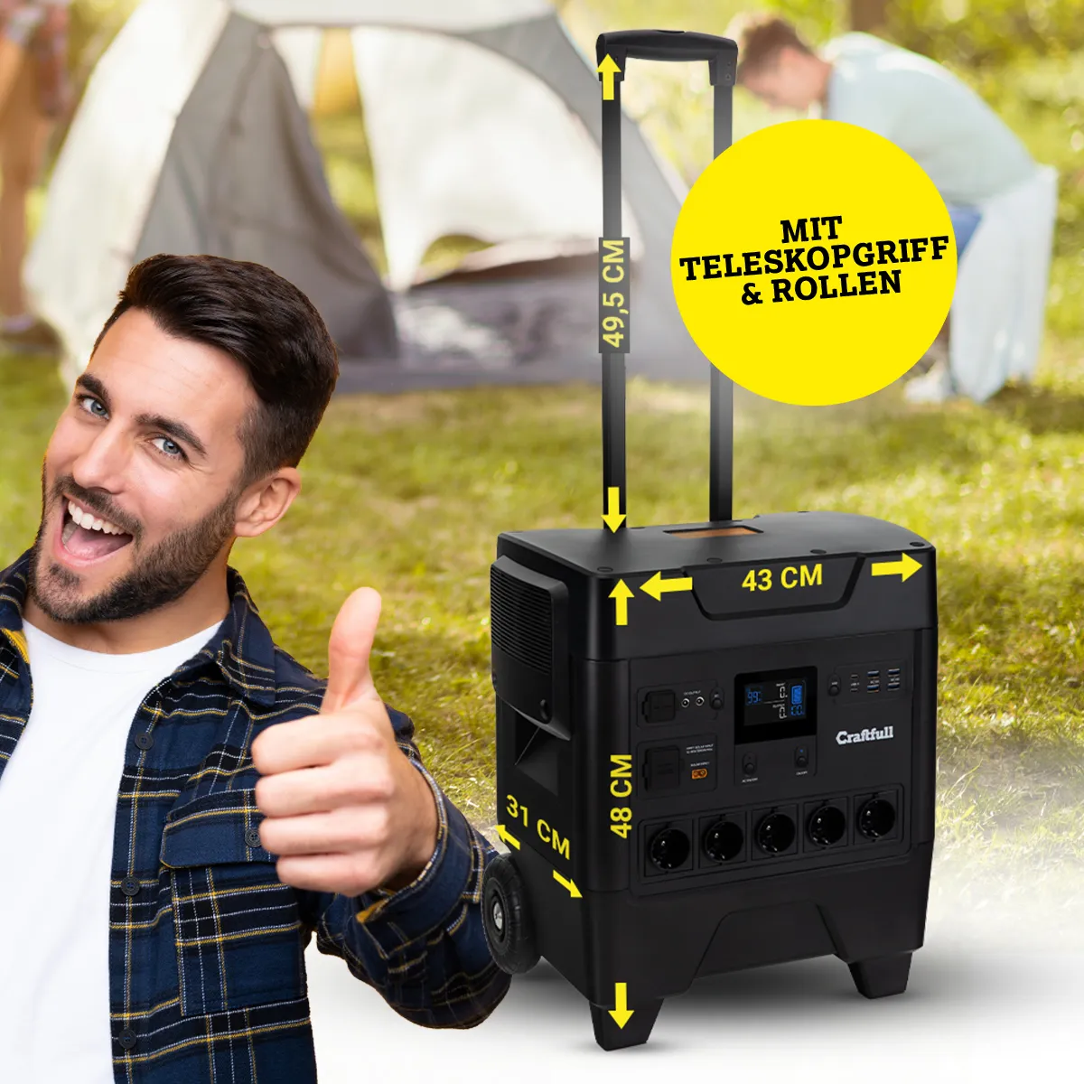 Mobile Powerstation mit Rollen und Griff Mann rollt die Powerstation dank des Teleskopgriffs und der Rollen über eine Wiese